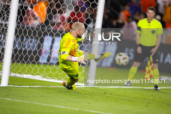 Seattle Sounders goalkeeper Stefan Frei makes the match-winning save during a penalty shoot-out, blocking a shot from Houston Dynamo defende...