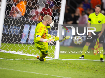 Seattle Sounders goalkeeper Stefan Frei makes the match-winning save during a penalty shoot-out, blocking a shot from Houston Dynamo defende...