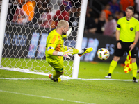 Seattle Sounders goalkeeper Stefan Frei makes the match-winning save during a penalty shoot-out, blocking a shot from Houston Dynamo defende...