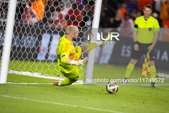 Seattle Sounders goalkeeper Stefan Frei makes the match-winning save during a penalty shoot-out, blocking a shot from Houston Dynamo defende...