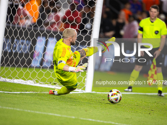 Seattle Sounders goalkeeper Stefan Frei makes the match-winning save during a penalty shoot-out, blocking a shot from Houston Dynamo defende...