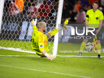 Seattle Sounders goalkeeper Stefan Frei makes the match-winning save during a penalty shoot-out, blocking a shot from Houston Dynamo defende...