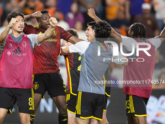 Seattle Sounders celebrate after winning a playoff match against Houston Dynamo at Shell Energy Stadium in Houston, Texas, on November 3, 20...