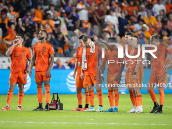 Houston Dynamo players line up during a penalty shoot-out in a playoff match against Seattle Sounders in Houston, Texas, on November 3, 2024...