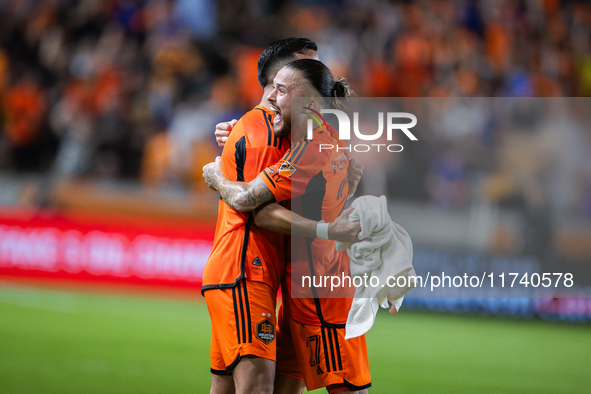 Houston Dynamo players celebrate after a goal during a playoff match in Houston, Texas, on November 3, 2024, at Shell Energy Stadium. 