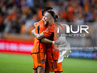 Houston Dynamo players celebrate after a goal during a playoff match in Houston, Texas, on November 3, 2024, at Shell Energy Stadium. (