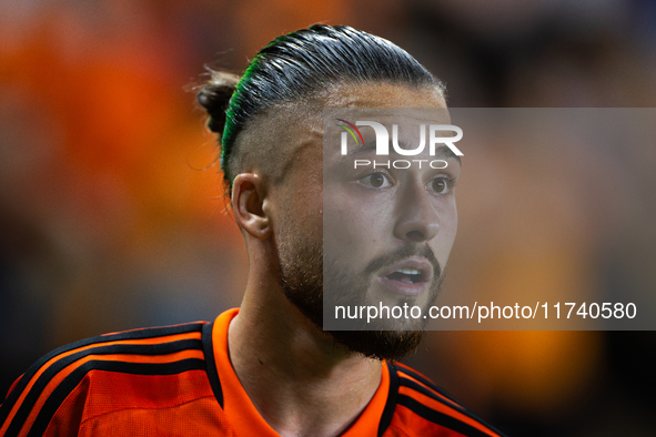 Houston Dynamo midfielder Sebastian Kowalczyk participates in a playoff match between Houston Dynamo and Seattle Sounders in Houston, Texas,...