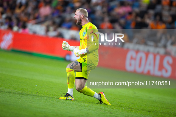 Seattle Sounders goalkeeper Stefan Frei celebrates after his team scores a goal during a playoff match between Houston Dynamo and Seattle So...