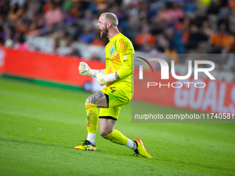 Seattle Sounders goalkeeper Stefan Frei celebrates after his team scores a goal during a playoff match between Houston Dynamo and Seattle So...