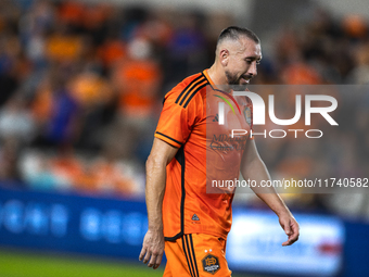 Houston Dynamo captain Hector Herrera walks off the pitch after receiving a red card during a playoff match between Houston Dynamo and Seatt...