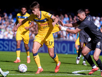 Charles De Ketelaere of Atalanta BC and Alessandro Buongiorno of SSC Napoli compete for the ball during the serie Serie A Enilive match betw...