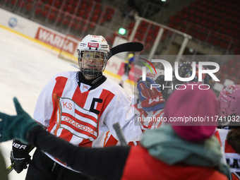 The KS Cracovia 1906 team plays against MMKS Podhale Nowy Targ at the Adam 'Roch' Kowalski ice rink on the occasion of the 20th anniversary...