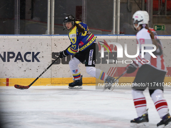 A hockey match takes place between KS Cracovia 1906 (reds) and MMKS Podhale Nowy Targ (blues) at the Adam 'Roch' Kowalski ice rink on the oc...