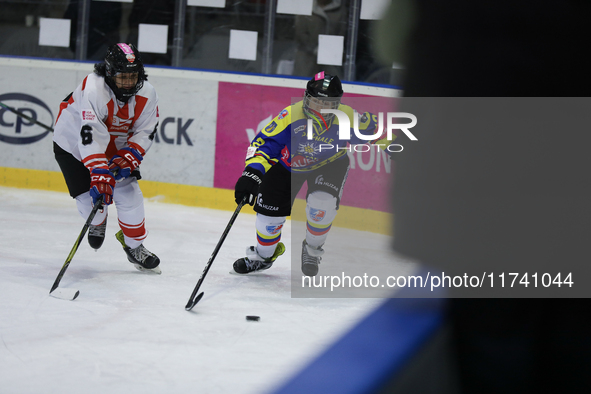 A hockey match takes place between KS Cracovia 1906 (reds) and MMKS Podhale Nowy Targ (blues) at the Adam 'Roch' Kowalski ice rink on the oc...