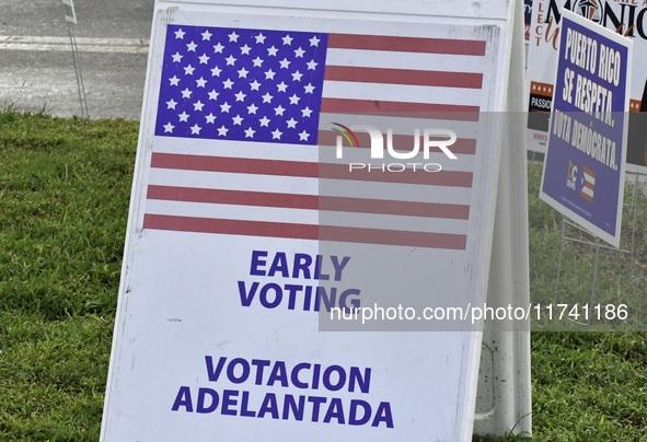 Residents of Orange County in Central Florida participate in early voting for the US presidential elections on December 3. 