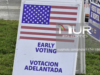 Residents of Orange County in Central Florida participate in early voting for the US presidential elections on December 3. (