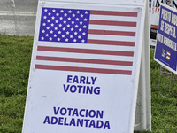 Residents of Orange County in Central Florida participate in early voting for the US presidential elections on December 3. (