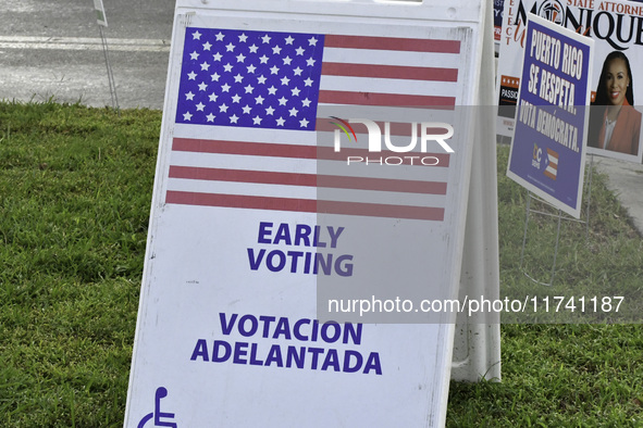 Residents of Orange County in Central Florida participate in early voting for the US presidential elections on December 3. 