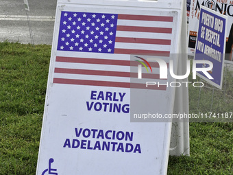 Residents of Orange County in Central Florida participate in early voting for the US presidential elections on December 3. (