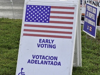 Residents of Orange County in Central Florida participate in early voting for the US presidential elections on December 3. (