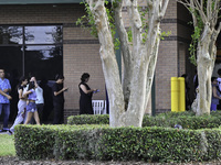 Residents of Orange County in Central Florida participate in early voting for the US presidential elections on December 3. (