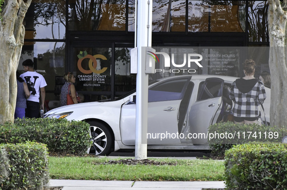 Residents of Orange County in Central Florida participate in early voting for the US presidential elections on December 3. 