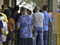 Residents of Orange County in Central Florida participate in early voting for the US presidential elections on December 3. (