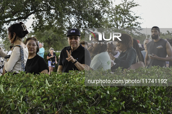 Residents of Orange County in Central Florida participate in early voting for the US presidential elections on December 3. 