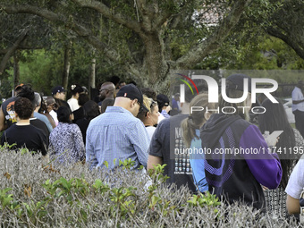 Residents of Orange County in Central Florida participate in early voting for the US presidential elections on December 3. (