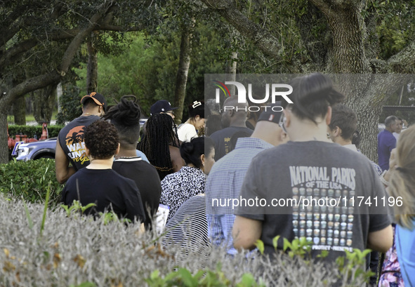 Residents of Orange County in Central Florida participate in early voting for the US presidential elections on December 3. 