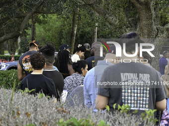 Residents of Orange County in Central Florida participate in early voting for the US presidential elections on December 3. (