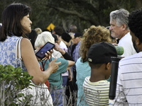 Residents of Orange County in Central Florida participate in early voting for the US presidential elections on December 3. (