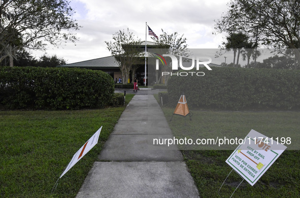 Residents of Orange County in Central Florida participate in early voting for the US presidential elections on December 3. 