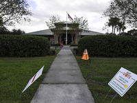 Residents of Orange County in Central Florida participate in early voting for the US presidential elections on December 3. (