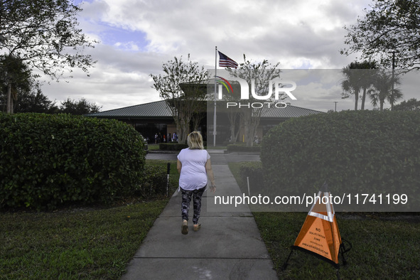 Residents of Orange County in Central Florida participate in early voting for the US presidential elections on December 3. 