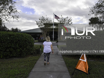 Residents of Orange County in Central Florida participate in early voting for the US presidential elections on December 3. (