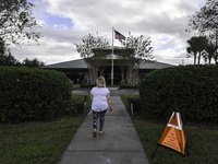 Residents of Orange County in Central Florida participate in early voting for the US presidential elections on December 3. (