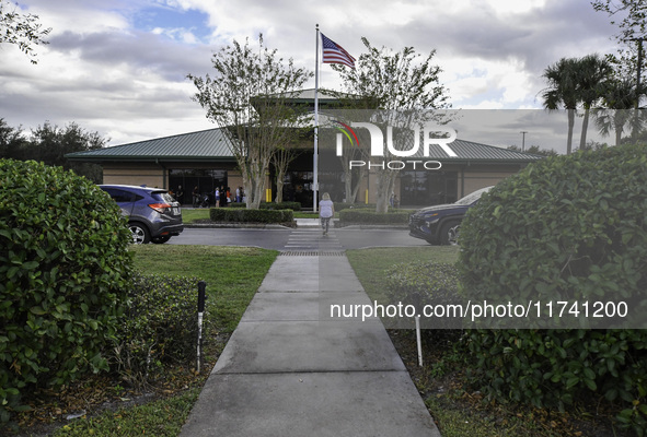 Residents of Orange County in Central Florida participate in early voting for the US presidential elections on December 3. 