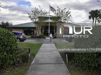 Residents of Orange County in Central Florida participate in early voting for the US presidential elections on December 3. (