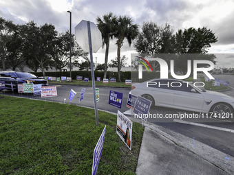 Residents of Orange County in Central Florida participate in early voting for the US presidential elections on December 3. (