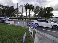 Residents of Orange County in Central Florida participate in early voting for the US presidential elections on December 3. (