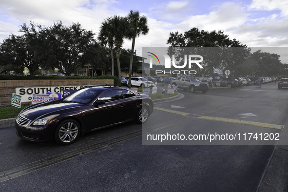 Residents of Orange County in Central Florida participate in early voting for the US presidential elections on December 3. 