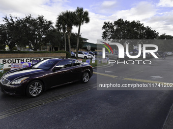 Residents of Orange County in Central Florida participate in early voting for the US presidential elections on December 3. (