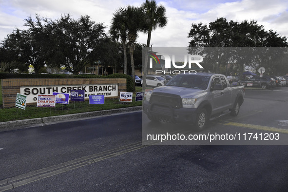 Residents of Orange County in Central Florida participate in early voting for the US presidential elections on December 3. 