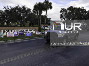 Residents of Orange County in Central Florida participate in early voting for the US presidential elections on December 3. (