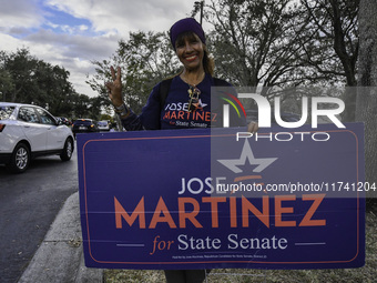 Residents of Orange County in Central Florida participate in early voting for the US presidential elections on December 3. (