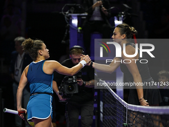 RIYADH, SAUDI ARABIA - NOVEMBER 04: Jasmine Paolini of Italy congratulates Aryna Sabalenka of Belarus on her victory at the end of their mat...