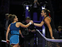 RIYADH, SAUDI ARABIA - NOVEMBER 04: Jasmine Paolini of Italy congratulates Aryna Sabalenka of Belarus on her victory at the end of their mat...