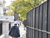 On November 4, 2024, in Washington, DC, a day before election day, the Secret Service and businesses board up the front of buildings and pla...