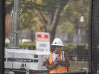 On November 4, 2024, in Washington, DC, a day before election day, the Secret Service and businesses board up the front of buildings and pla...